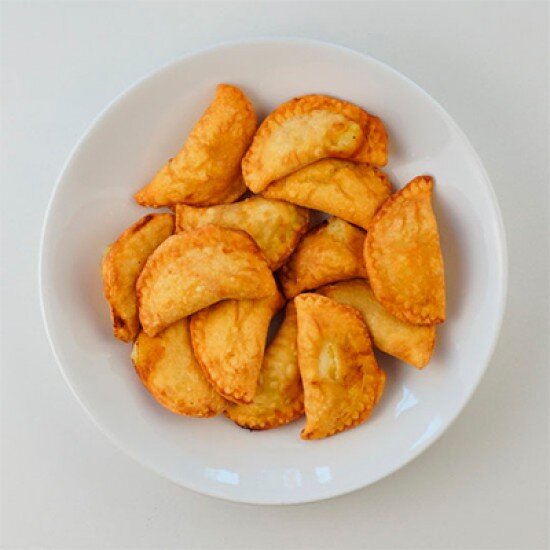 Вареники жареные с соусом