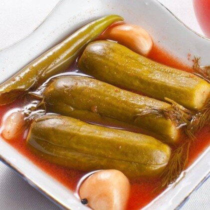 Огурцы в томатном соке