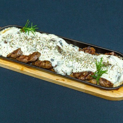 Медальоны в фирменном грибном соусе