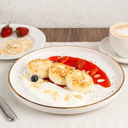 Сырники с клубничным соусом